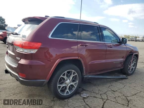 2018 Jeep Grand Cherokee Sterling с VIN 1C4RJFBG1JC251563, выставлен на аукционе Copart как лот 90716005 с пробегом 84 046 миль миль и Списание • Salvage title. История ставок и продаж доступна на DreamBid. Изображение 3.