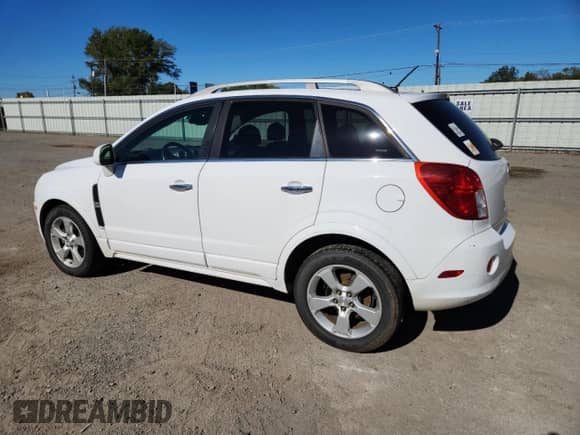 2015 Chevrolet Captiva Sport LT z VIN 3GNAL3EK1FS529893, wystawiony jako Copart lot #91057205 z przebiegiem 157 380 mil mil oraz Czysty tytuł • Clean title. Historia ofert i sprzedaży dostępna na DreamBid. Obrazek 2.