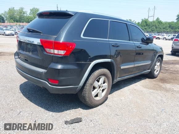 ✅ 2011 Jeep Grand Cherokee Laredo • VIN: 1J4RR4GG7BC596730 • Lot: 42473954. Listed on IAAI with 163,674 mi. Free auction sales archive from the USA and detailed vehicle history report at DreamBid. Image 4.