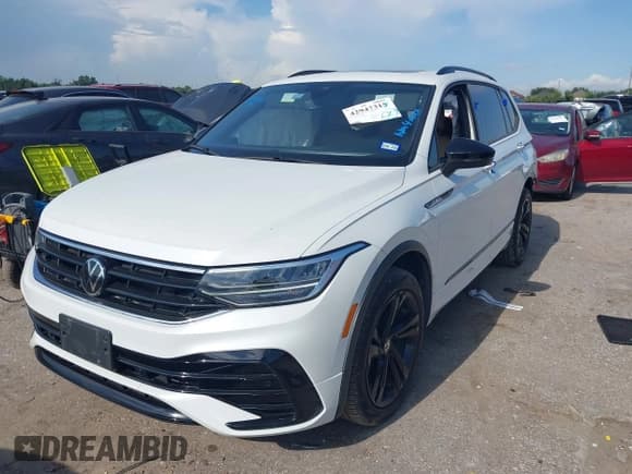 ✅ 2024 Volkswagen Tiguan SE R-Line Black • VIN: 3VVCB7AX8RM073625 • Лот: 42947315. Опубликован ранее на IAAI с пробегом 19 745 миль. Бесплатный доступ к архиву аукционных продаж из США и подробный отчёт об истории автомобиля на DreamBid. Изображение 16.
