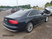 ✅ 2013 Audi A8 3.0L • VIN: WAUAGAFD8DN025900 • Lot: 42623843. Listed on IAAI with 98,516 mi. Free auction sales archive from the USA and detailed vehicle history report at DreamBid. Image 4.
