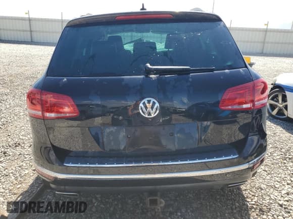 ✅ 2015 Volkswagen Touareg Executive • VIN: WVGEP9BP5FD005577 • Lot: 70913024. Listed on Copart with Not provided. Free auction sales archive from the USA and detailed vehicle history report at DreamBid. Image 6.
