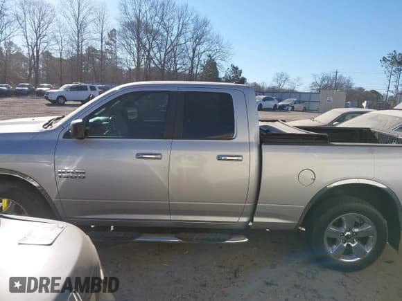 ✅ 2015 Ram 1500 SLT • VIN: 1C6RR6GG0FS578106 • Lot: 41671542. Listed on IAAI with 103,159 mi. Free auction sales archive from the USA and detailed vehicle history report at DreamBid. Image 14.