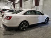 ✅ 2014 Ford Taurus SEL • VIN: 1FAHP2H81EG137876 • Lot: 91455125. Listed on Copart with 216,731 mi. Free auction sales archive from the USA and detailed vehicle history report at DreamBid. Image 3.