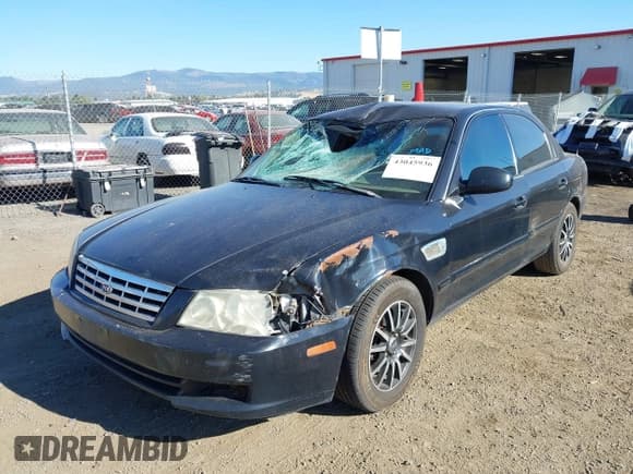 ✅ 2002 Kia Optima LX • VIN: KNAGD126425142378 • Lot: 43045936. Listed on IAAI with 259,185 mi. Free auction sales archive from the USA and detailed vehicle history report at DreamBid. Image 17.
