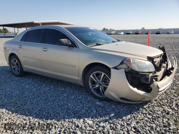 ✅ 2011 Chevrolet Malibu 1LS • VIN: 1G1ZB5E1XBF267185 • Lot: 82635645. Listed on Copart with 182,144 mi. Free auction sales archive from the USA and detailed vehicle history report at DreamBid. Image 4.