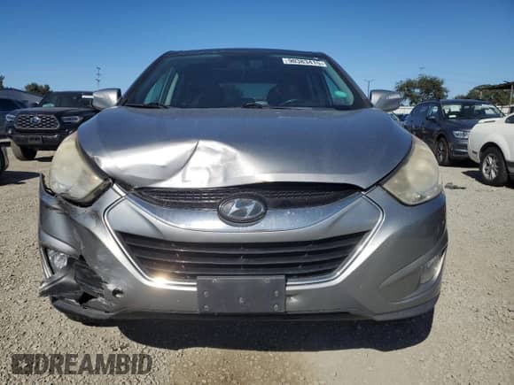 2012 Hyundai Tucson GLS with VIN KM8JU3AC2CU497998, listed as a Copart auction lot 90383415 with 239,792 mi miles and Clean title. Bid and sale history available at DreamBid. Image 5.