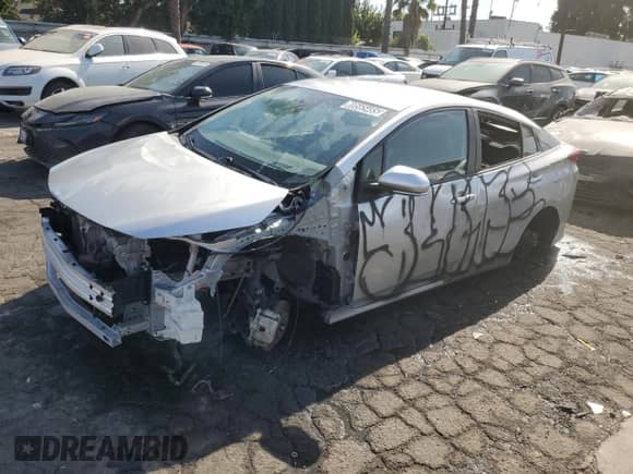 2022 Toyota Prius LE с VIN JTDKAMFP7N3228892, выставлен на аукционе Copart как лот 69565485 с пробегом 23 576 миль миль и Списание • Salvage title. История ставок и продаж доступна на DreamBid. Изображение 1.