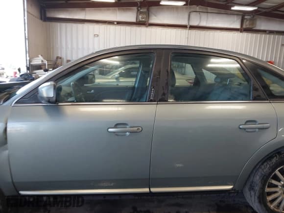 ✅ 2007 Mercury Montego Premier • VIN: 1MEHM43117G612002 • Лот: 42497905. Опубликован ранее на IAAI с пробегом 127 451 миль. Бесплатный доступ к архиву аукционных продаж из США и подробный отчёт об истории автомобиля на DreamBid. Изображение 14.