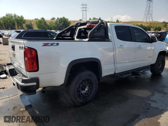 ✅ 2015 Chevrolet Colorado 4WD Z71 • VIN: 1GCGTCE30F1117168 • Лот: 63427044. Опубликован ранее на Copart с пробегом 164 972 миль. Бесплатный доступ к архиву аукционных продаж из США и подробный отчёт об истории автомобиля на DreamBid. Изображение 3.