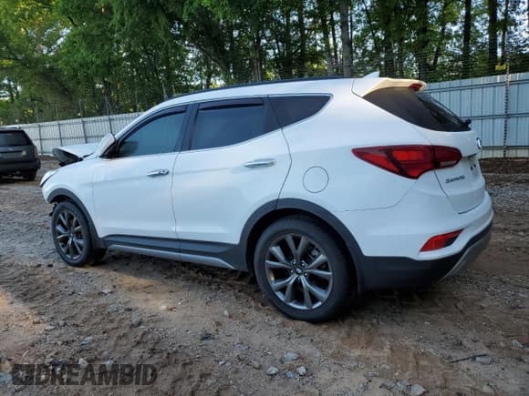 ✅ 2018 Hyundai Santa Fe Ultimate • VIN: 5NMZWDLAXJH066817 • Лот: 52575364. Опубликован ранее на Copart с пробегом 35 043 миль. Бесплатный доступ к архиву аукционных продаж из США и подробный отчёт об истории автомобиля на DreamBid. Изображение 2.
