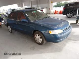 ✅ 1998 Toyota Corolla LE • VIN: 2T1BR18E9WC016104 • Lot: 43838320. Listed on IAAI with 110,096 mi. Free auction sales archive from the USA and detailed vehicle history report at DreamBid. Image 1.