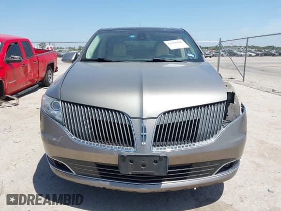 ✅ 2016 Lincoln MKT EcoBoost • VIN: 2LMHJ5AT9GBL01039 • Lot: 42860808. Wystawiony na IAAI z przebiegiem 124 787 mil. Bezpłatny archiwum sprzedaży aukcyjnych z USA i szczegółowy raport historii pojazdu na DreamBid. Zdjęcie 13.