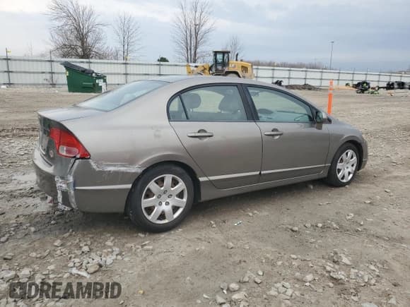 ✅ 2007 Honda Civic LX • VIN: 1HGFA16537L070991 • Lot: 53916505. Listed on Copart with 169,648 mi. Free auction sales archive from the USA and detailed vehicle history report at DreamBid. Image 3.