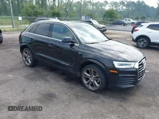 ✅ 2017 Audi Q3 Prestige • VIN: WA1GCCFS9HR005523 • Lot: 42573661. Listed on IAAI with 128,154 mi. Free auction sales archive from the USA and detailed vehicle history report at DreamBid. Image 1.