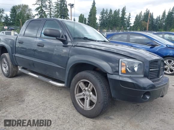 ✅ 2007 Dodge Dakota SLT • VIN: 1D7HW48P37S144432 • Лот: 42945589. Опубликован ранее на IAAI с пробегом 143 643 миль. Бесплатный доступ к архиву аукционных продаж из США и подробный отчёт об истории автомобиля на DreamBid. Изображение 1.