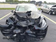 ✅ 2025 Tesla Model Y Performance • VIN: 7SAYGDEF2SA341357 • Lot: 42371620. Listed on IAAI with 4,859 mi. Free auction sales archive from the USA and detailed vehicle history report at DreamBid. Image 13.