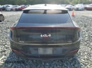 ✅ 2022 Kia EV6 GT-Line • VIN: KNDC44LA2N5078612 • Лот: 57442345. Опубликован ранее на Copart с пробегом 84 917 миль. Бесплатный доступ к архиву аукционных продаж из США и подробный отчёт об истории автомобиля на DreamBid. Изображение 6.