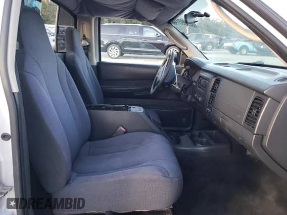 2003 Dodge Dakota с VIN 1D7GG16X33S130101, выставлен на аукционе Copart как лот 85999314 с пробегом 221 292 миль миль и Списание • Salvage title. История ставок и продаж доступна на DreamBid. Изображение 11.