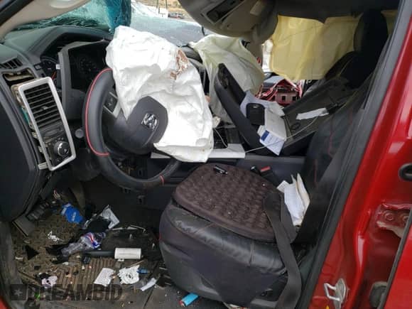 2009 Dodge 1500 SLT с VIN 1D3HV18T29S824700, выставлен на аукционе Copart как лот 70041984 с пробегом Не указан миль и Списание • Salvage title. История ставок и продаж доступна на DreamBid. Изображение 7.