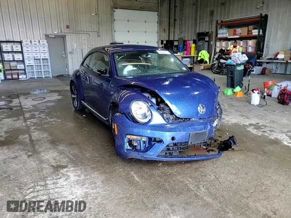 ✅ 2014 Volkswagen Beetle Turbo R-Line • VIN: 3VWVT7AT2EM629047 • Лот: 46820915. Опубликован ранее на Copart с пробегом 96 290 миль. Бесплатный доступ к архиву аукционных продаж из США и подробный отчёт об истории автомобиля на DreamBid. Изображение 13.