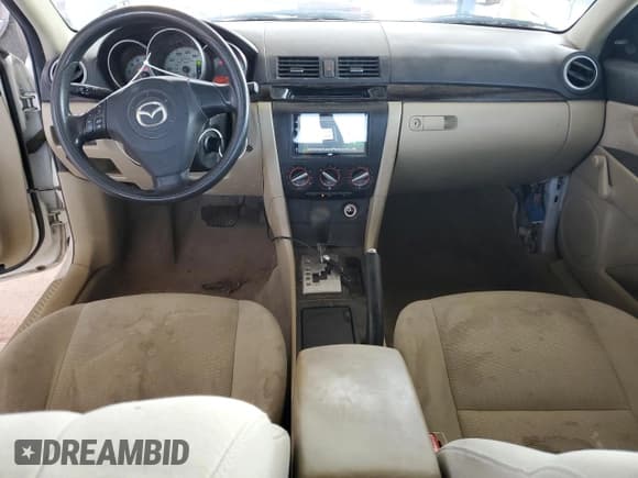 ✅ 2007 Mazda 3 i Sport • VIN: JM1BK12G971729296 • Лот: 70230525. Опубликован ранее на Copart с пробегом 188 238 миль. Бесплатный доступ к архиву аукционных продаж из США и подробный отчёт об истории автомобиля на DreamBid. Изображение 8.