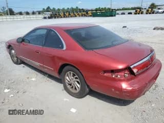 ✅ 1998 Lincoln Mark VIII • VIN: 1LNFM91V9WY660766 • Лот: 83826355. Опубликован ранее на Copart с пробегом 223 106 миль. Бесплатный доступ к архиву аукционных продаж из США и подробный отчёт об истории автомобиля на DreamBid. Изображение 2.