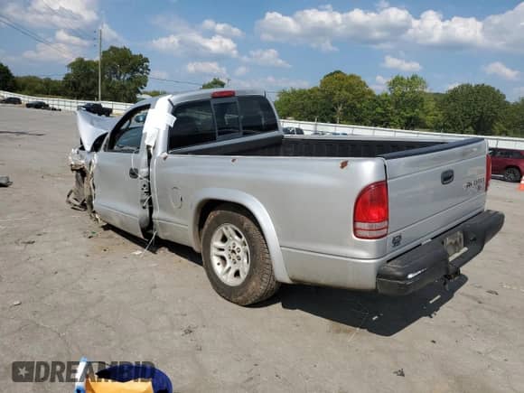 2003 Dodge Dakota с VIN 1D7FL16X93S301215, выставлен на аукционе Copart как лот 68710654 с пробегом 272 870 миль миль и Чистый • Clean title. История ставок и продаж доступна на DreamBid. Изображение 2.