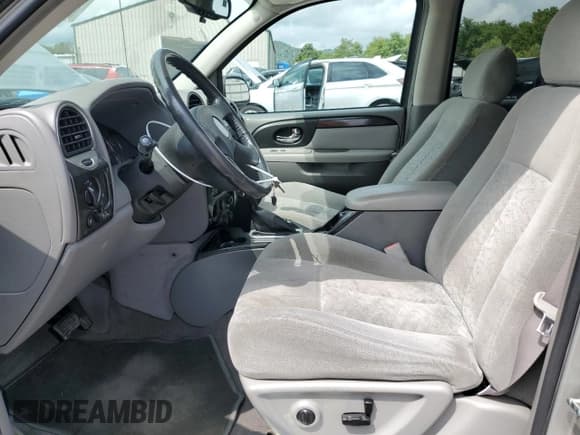 ✅ 2005 GMC Envoy SLE • VIN: 1GKDS13S752189079 • Лот: 71419365. Опубликован ранее на Copart с пробегом 122 219 миль. Бесплатный доступ к архиву аукционных продаж из США и подробный отчёт об истории автомобиля на DreamBid. Изображение 7.