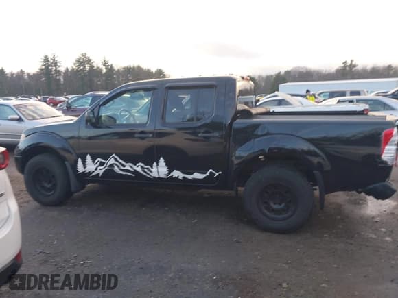 ✅ 2013 Nissan Frontier SV • VIN: 1N6AD0EV9DN745767 • Lot: 43795818. Listed on IAAI with 142,540 mi. Free auction sales archive from the USA and detailed vehicle history report at DreamBid. Image 14.