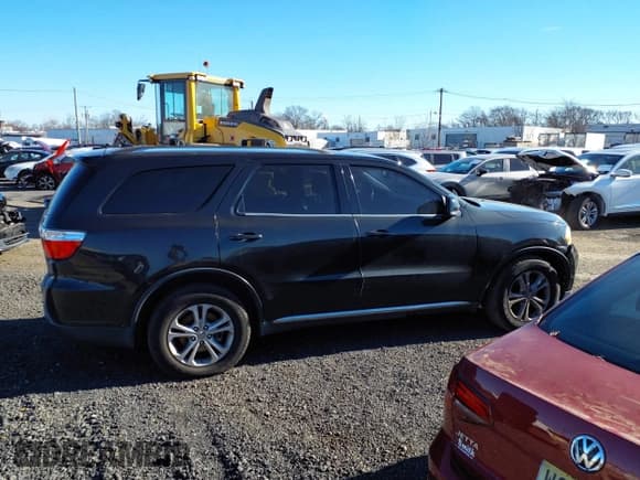 ✅ 2012 Dodge Durango Crew • VIN: 1C4SDJDT2CC104502 • Lot: 43857614. Listed on IAAI with 132,005 mi. Free auction sales archive from the USA and detailed vehicle history report at DreamBid. Image 13.