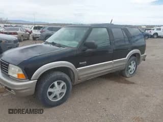 ✅ 2000 Oldsmobile Bravada • VIN: 1GHDT13W4Y2278005 • Lot: 42099863. Listed on IAAI with 142,031 mi. Free auction sales archive from the USA and detailed vehicle history report at DreamBid. Image 2.