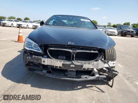✅ 2018 BMW 6 Series 650i xDrive • VIN: WBA6F7C57JG232299 • Лот: 64052295. Опубликован ранее на Copart с пробегом 29 027 миль. Бесплатный доступ к архиву аукционных продаж из США и подробный отчёт об истории автомобиля на DreamBid. Изображение 5.