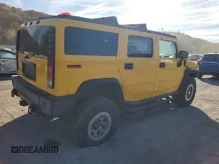 ✅ 2003 Hummer H2 • VIN: 5GRGN23U13H141352 • Лот: 77896844. Опубликован ранее на Copart с пробегом 147 723 миль. Бесплатный доступ к архиву аукционных продаж из США и подробный отчёт об истории автомобиля на DreamBid. Изображение 3.