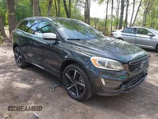 ✅ 2014 Volvo XC60 R-Design Premier Plus • VIN: YV4902DZ4E2555246 • Lot: 42120389. Listed on IAAI with 97,993 mi. Free auction sales archive from the USA and detailed vehicle history report at DreamBid. Image 1.