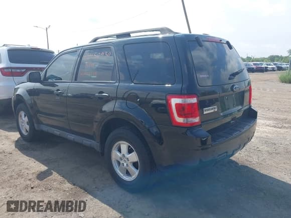 ✅ 2012 Ford Escape XLT • VIN: 1FMCU9DG3CKC30469 • Lot: 42450930. Listed on IAAI with 118,692 mi. Free auction sales archive from the USA and detailed vehicle history report at DreamBid. Image 3.