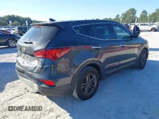 2017 Hyundai Santa Fe 2.4L z VIN 5XYZTDLB1HG468229, wystawiony jako IAAI lot #43426246 z przebiegiem 282 283 mil mil oraz . Historia ofert i sprzedaży dostępna na DreamBid. Obrazek 4.
