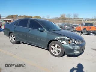 ✅ 2002 Toyota Camry XLE • VIN: JTDBF30K520004638 • Лот: 43641583. Опубликован ранее на IAAI с пробегом 248 015 миль. Бесплатный доступ к архиву аукционных продаж из США и подробный отчёт об истории автомобиля на DreamBid. Изображение 1.