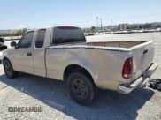 ✅ 1998 Ford F-150 • VIN: 1FTZX1729WKC18712 • Lot: 67794465. Listed on Copart with 326,008 mi. Free auction sales archive from the USA and detailed vehicle history report at DreamBid. Image 2.