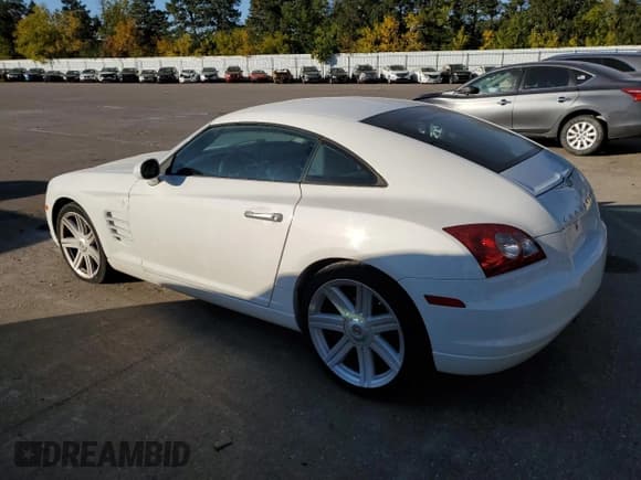 ✅ 2004 Chrysler Crossfire • VIN: 1C3AN69L94X002966 • Lot: 76795154. Listed on Copart with 14,235 mi. Free auction sales archive from the USA and detailed vehicle history report at DreamBid. Image 2.