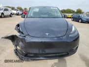 ✅ 2024 Tesla Model Y Long Range • VIN: 7SAYGDEE5RA301100 • Lot: 82557995. Listed on Copart with 22,288 mi. Free auction sales archive from the USA and detailed vehicle history report at DreamBid. Image 5.