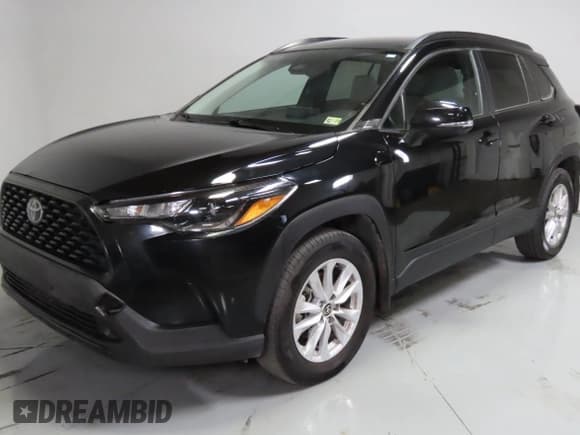 ✅ 2023 Toyota Corolla Cross LE • VIN: 7MUCAABG1PV064331 • Lot: 71099585. Wystawiony na Copart z przebiegiem 69 563 mil. Bezpłatny archiwum sprzedaży aukcyjnych z USA i szczegółowy raport historii pojazdu na DreamBid. Zdjęcie 2.