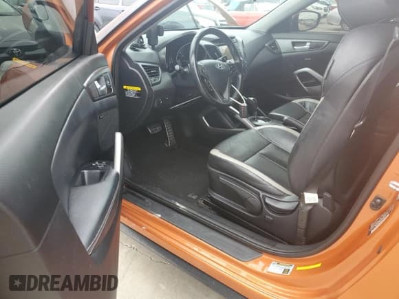 ✅ 2015 Hyundai Veloster Turbo • VIN: KMHTC6AE2FU232999 • Lot: 74919004. Wystawiony na Copart z przebiegiem 107 432 mil. Bezpłatny archiwum sprzedaży aukcyjnych z USA i szczegółowy raport historii pojazdu na DreamBid. Zdjęcie 8.