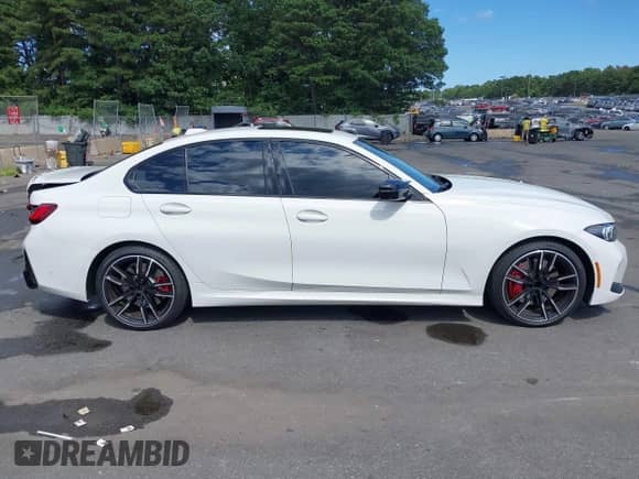 2023 BMW 3 Series M340i with VIN 3MW49FS00P8D11321, listed as a IAAI auction lot 42794821 with 46,037 mi miles and . Bid and sale history available at DreamBid. Image 14.