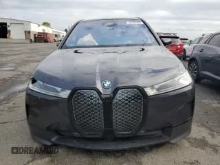 ✅ 2024 BMW iX xDrive50 • VIN: WB523CF01RCN99037 • Лот: 64291224. Опубликован ранее на Copart с пробегом 26 259 миль. Бесплатный доступ к архиву аукционных продаж из США и подробный отчёт об истории автомобиля на DreamBid. Изображение 5.