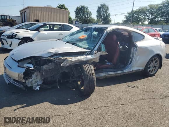 2008 Hyundai Tiburon GT z VIN KMHHN66F08U267030, wystawiony jako Copart lot #67479764 z przebiegiem Nie podano mil oraz Szkoda całkowita • Salvage title. Historia ofert i sprzedaży dostępna na DreamBid. Obrazek 1.