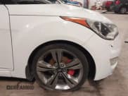 ✅ 2013 Hyundai Veloster w/Black Int • VIN: KMHTC6AD1DU109361 • Lot: 41101157. Wystawiony na IAAI z przebiegiem 119 386 mil. Bezpłatny archiwum sprzedaży aukcyjnych z USA i szczegółowy raport historii pojazdu na DreamBid. Zdjęcie 6.