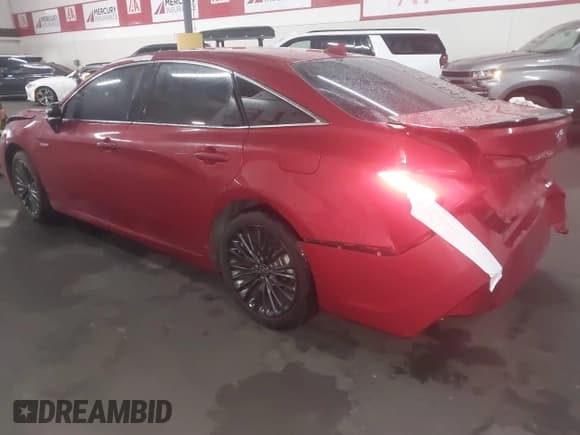 ✅ 2021 Toyota Avalon Hybrid XSE • VIN: 4T1EA1AB2MU004456 • Lot: 41060997. Listed on IAAI with 29,594 mi. Free auction sales archive from the USA and detailed vehicle history report at DreamBid. Image 3.