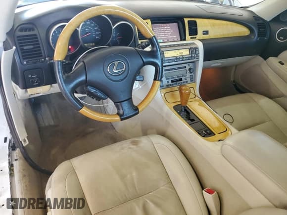 ✅ 2003 Lexus SC 430 • VIN: JTHFN48YX30045320 • Lot: 57385515. Listed on Copart with 104,178 mi. Free auction sales archive from the USA and detailed vehicle history report at DreamBid. Image 8.