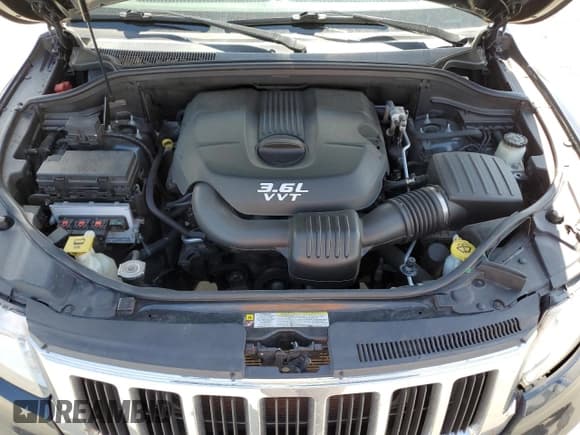 ✅ 2013 Jeep Grand Cherokee Laredo • VIN: 1C4RJFAG7DC645932 • Lot: 57969715. Listed on Copart with 165,717 mi. Free auction sales archive from the USA and detailed vehicle history report at DreamBid. Image 12.